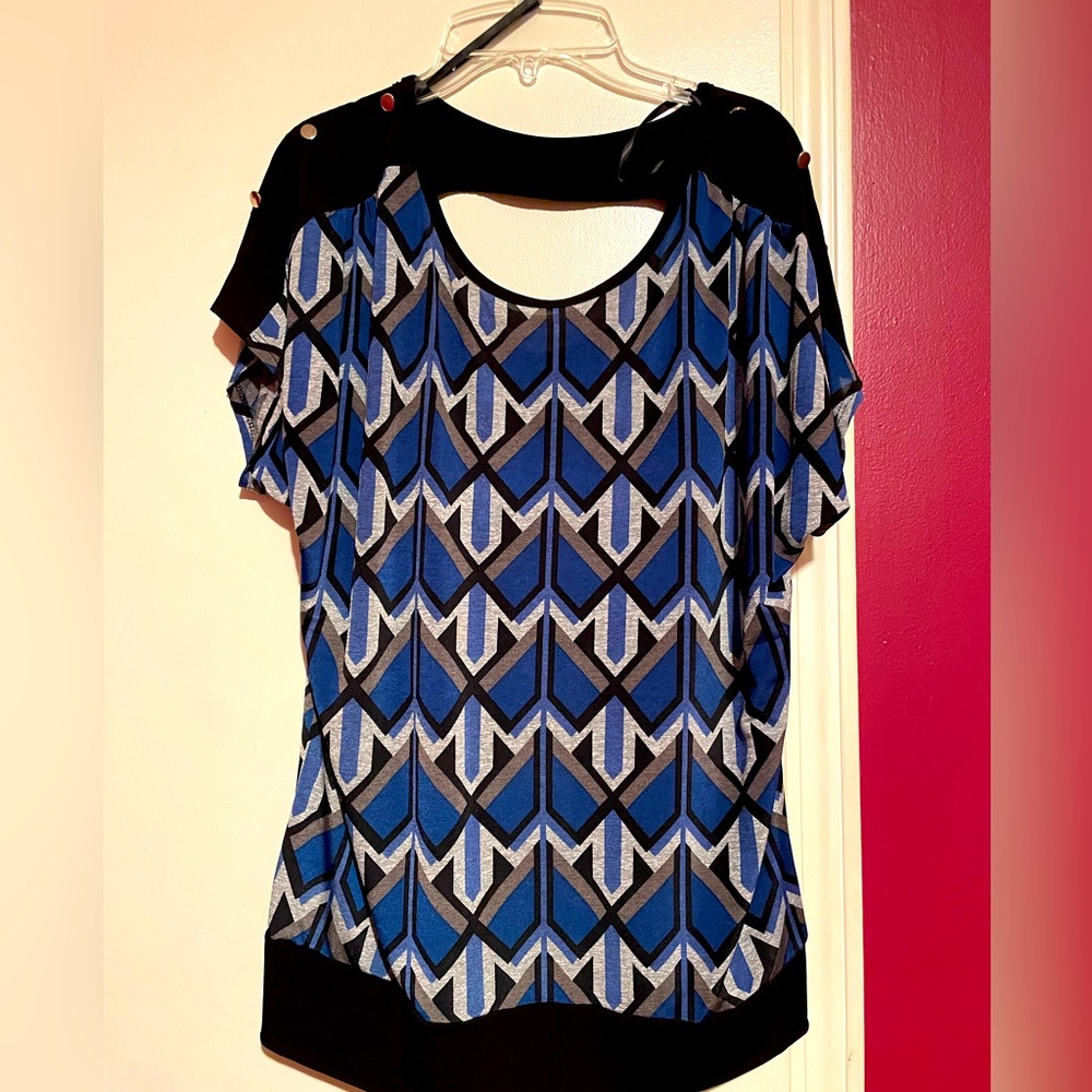 XL dressy top. Cut out in back.